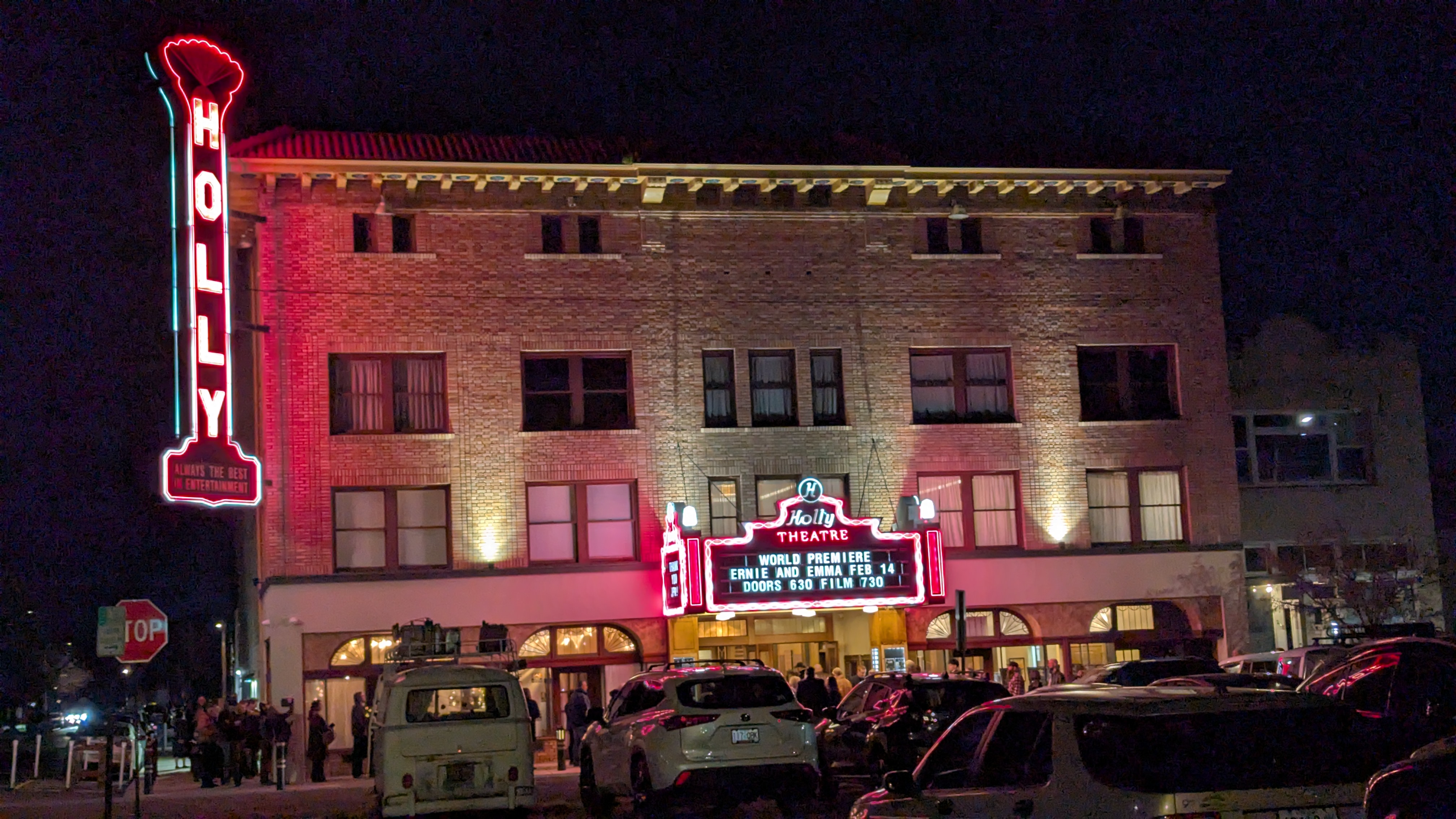 Holly Theatre exterior at night.