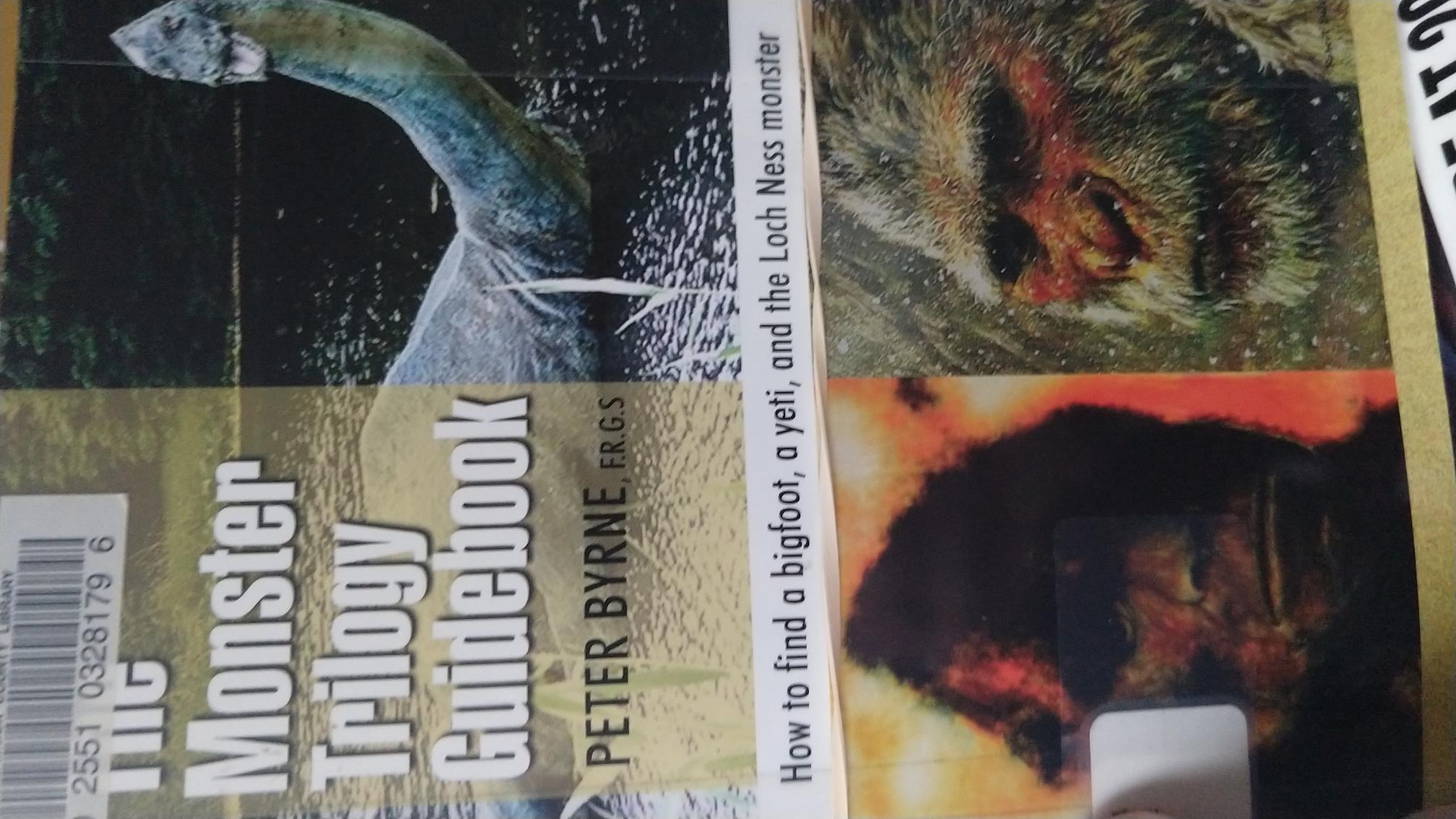 Cover of the Monster Trilogy Guidebook featuring Bigfoot, Yeti, and Loch Ness Monster.
