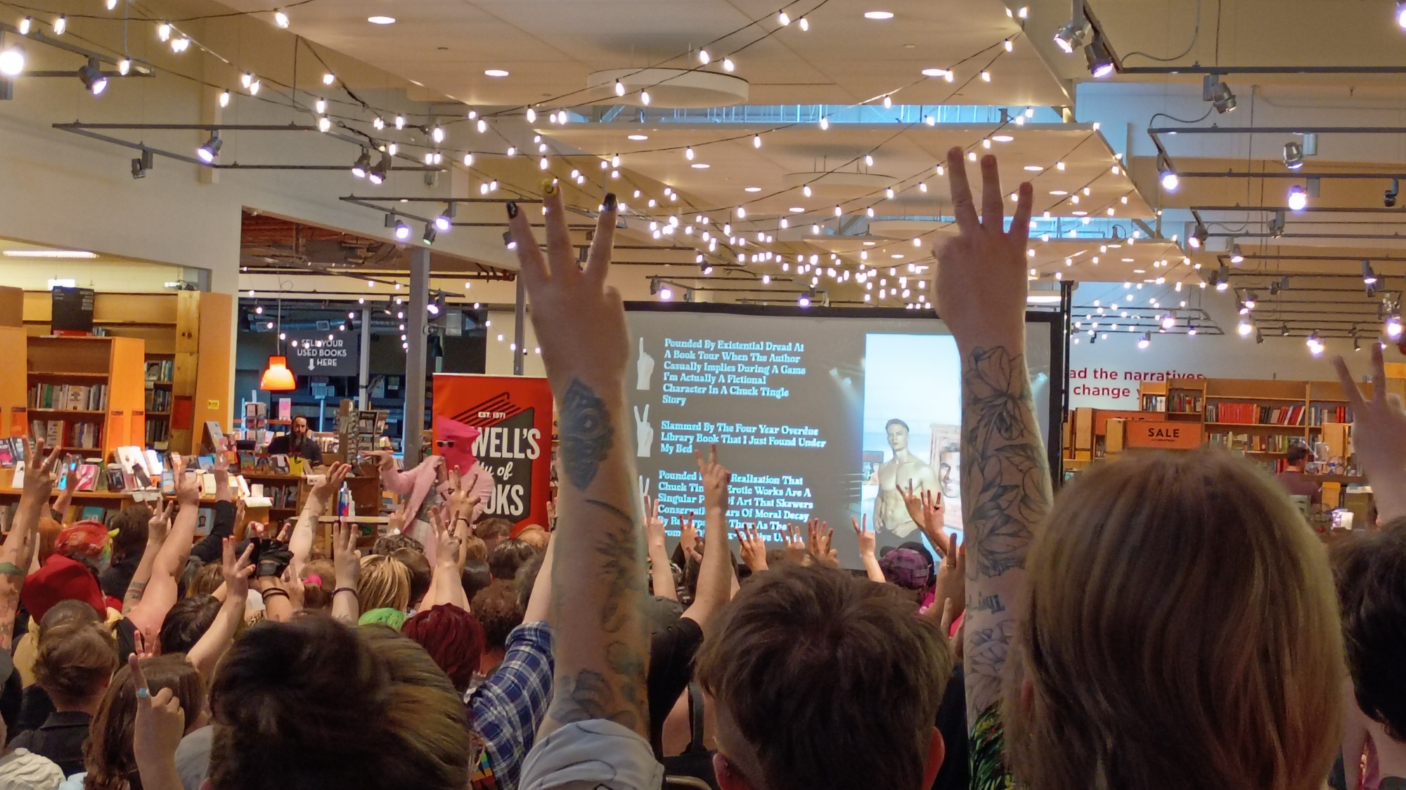 Picture of Chuck Tingle in an action pose during his author event.
