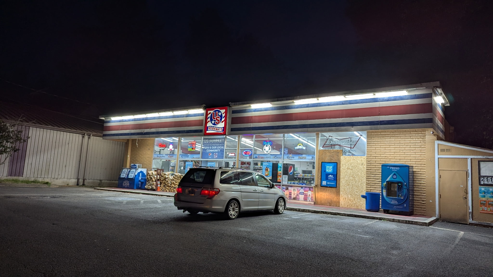 Gas station convenience store from the front on a cold winter's night.