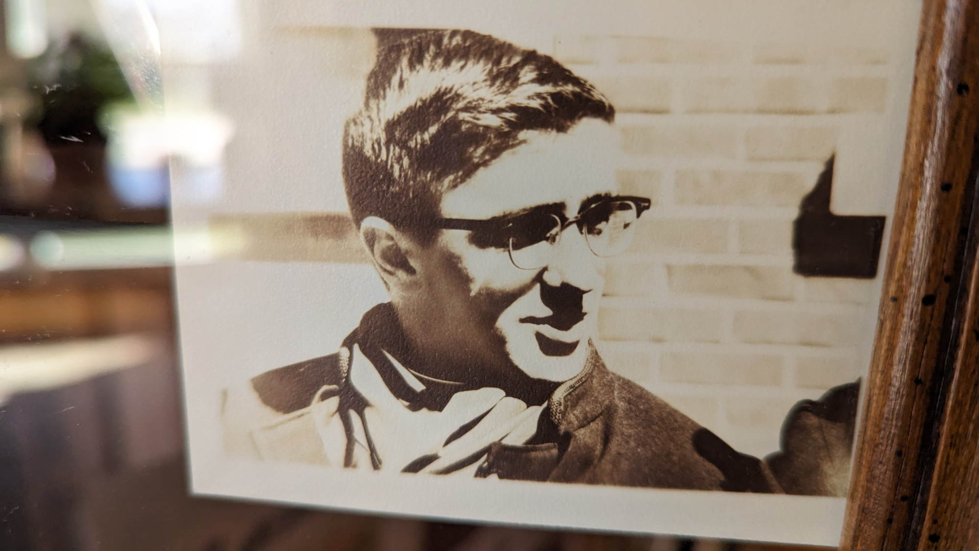 Picture of a black and white photograph of my father ad a young man.